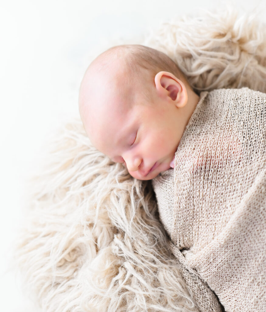 preparing for a studio newborn session